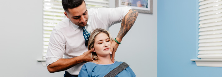 Chiropractor Sarasota FL Marcos Perivolaris Neck Adjustment